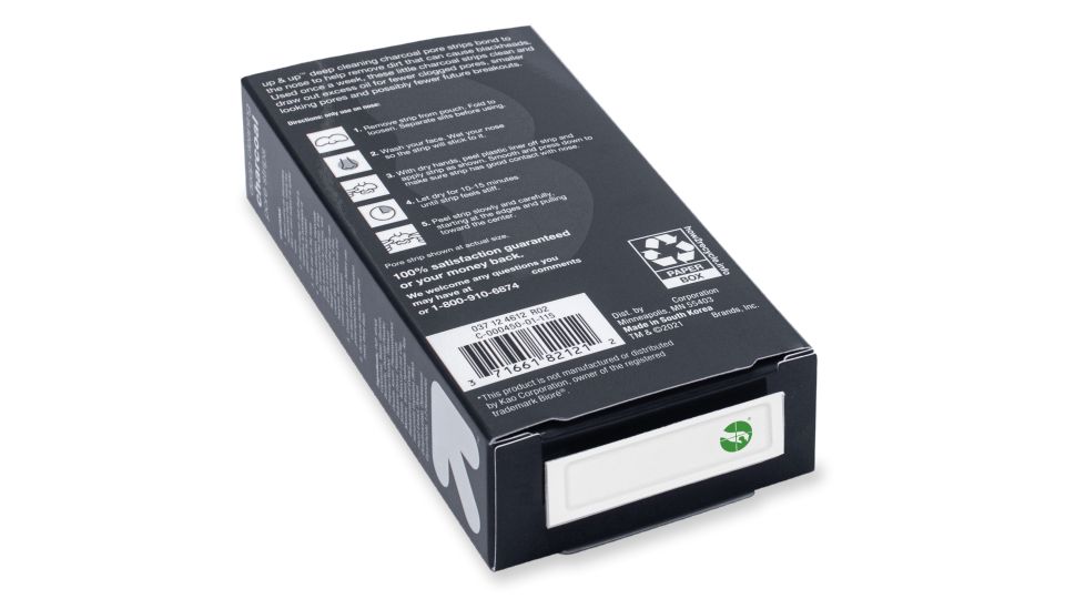 box with sensormatic sustainable label affixed to the bottom of the package